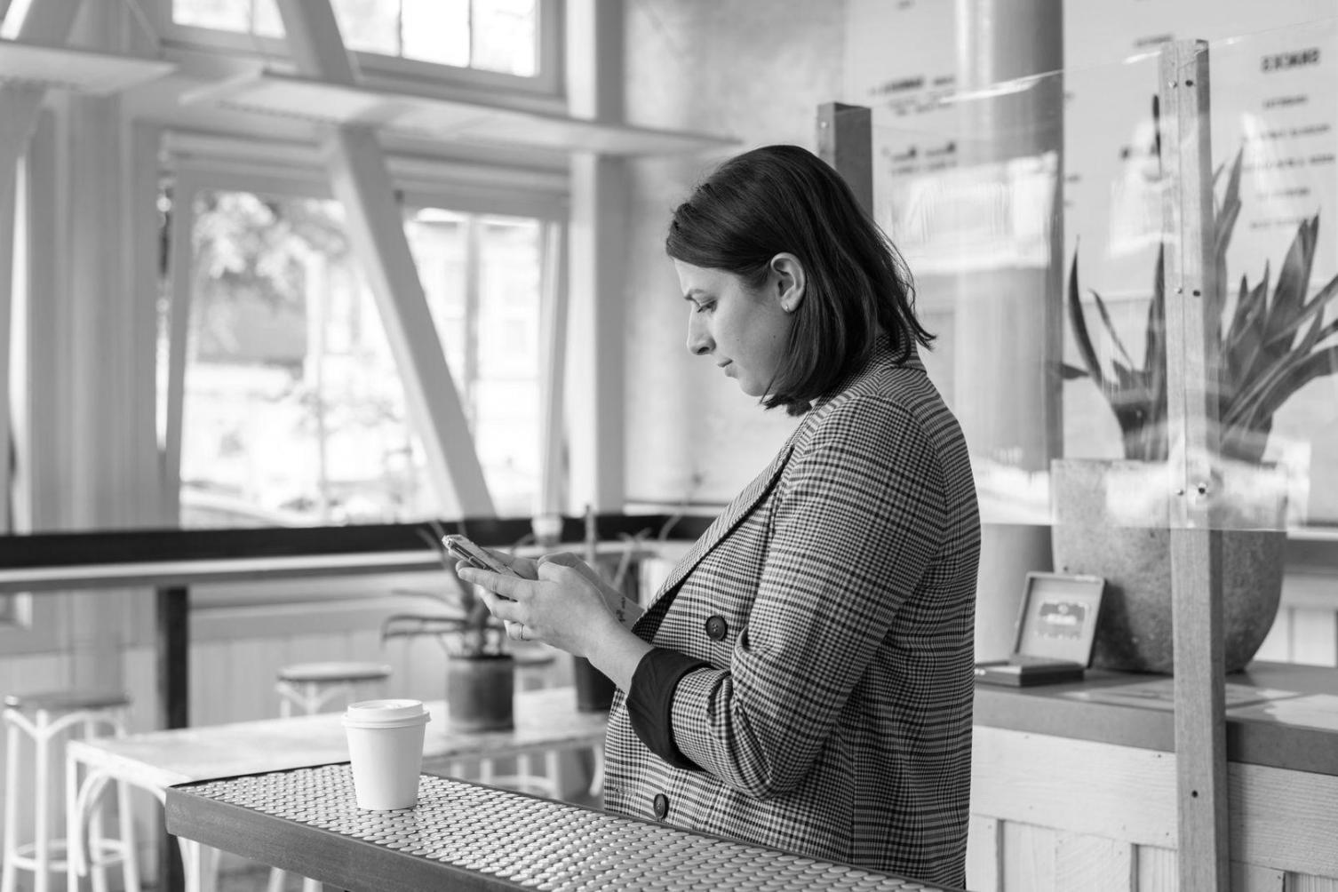 Professional workspace with financial analysis tools, documents, and modern technology setup