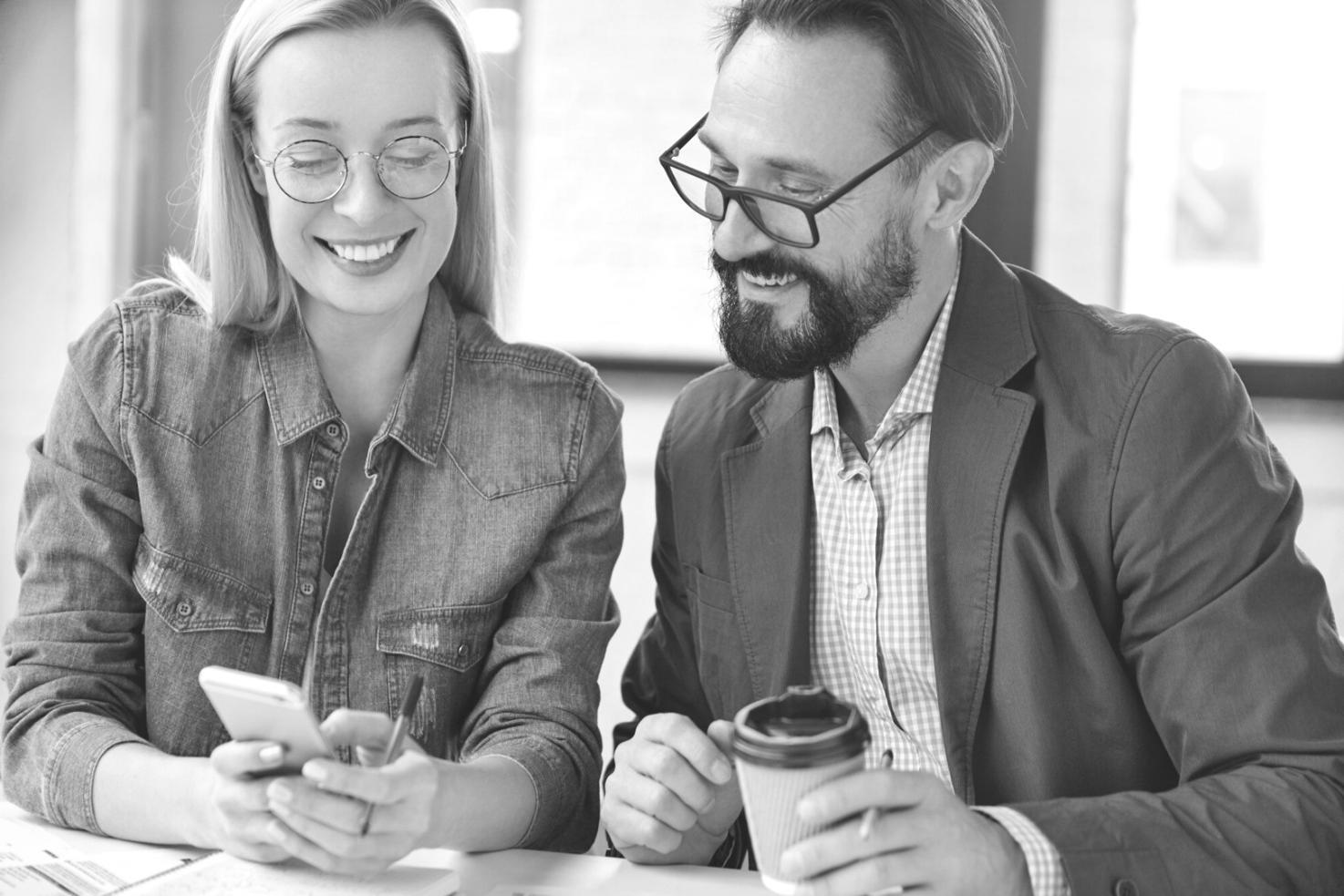 Business meeting with financial documents and calculator on conference table